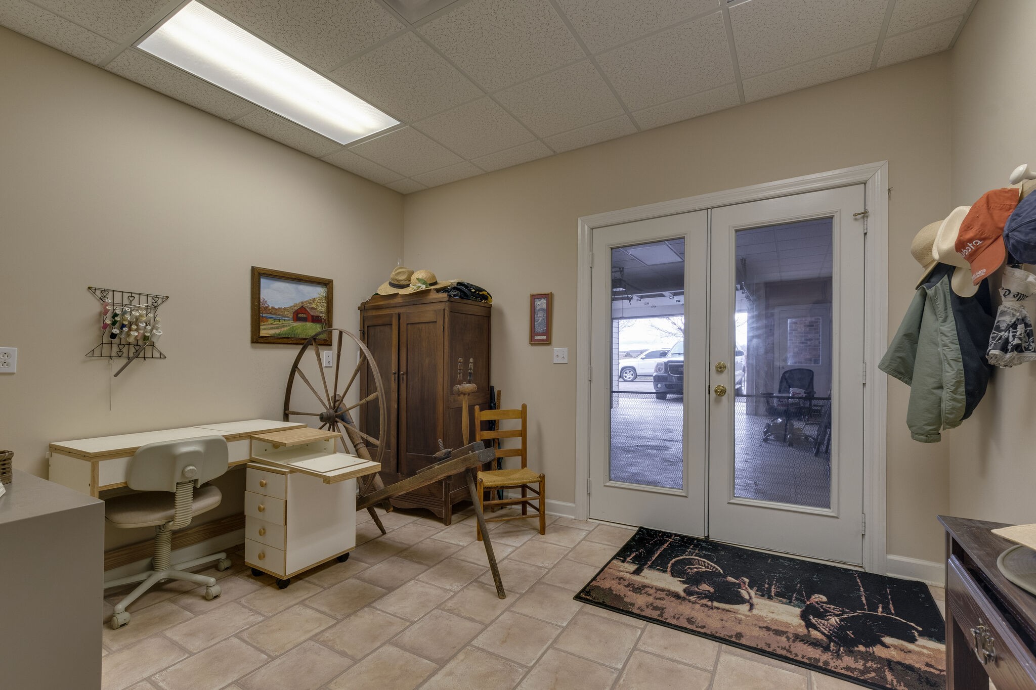 56 Stephens Creek Road Kelso, TN 37348 - Photo 29 of 47 a room with furniture a flat screen tv and gym equipment