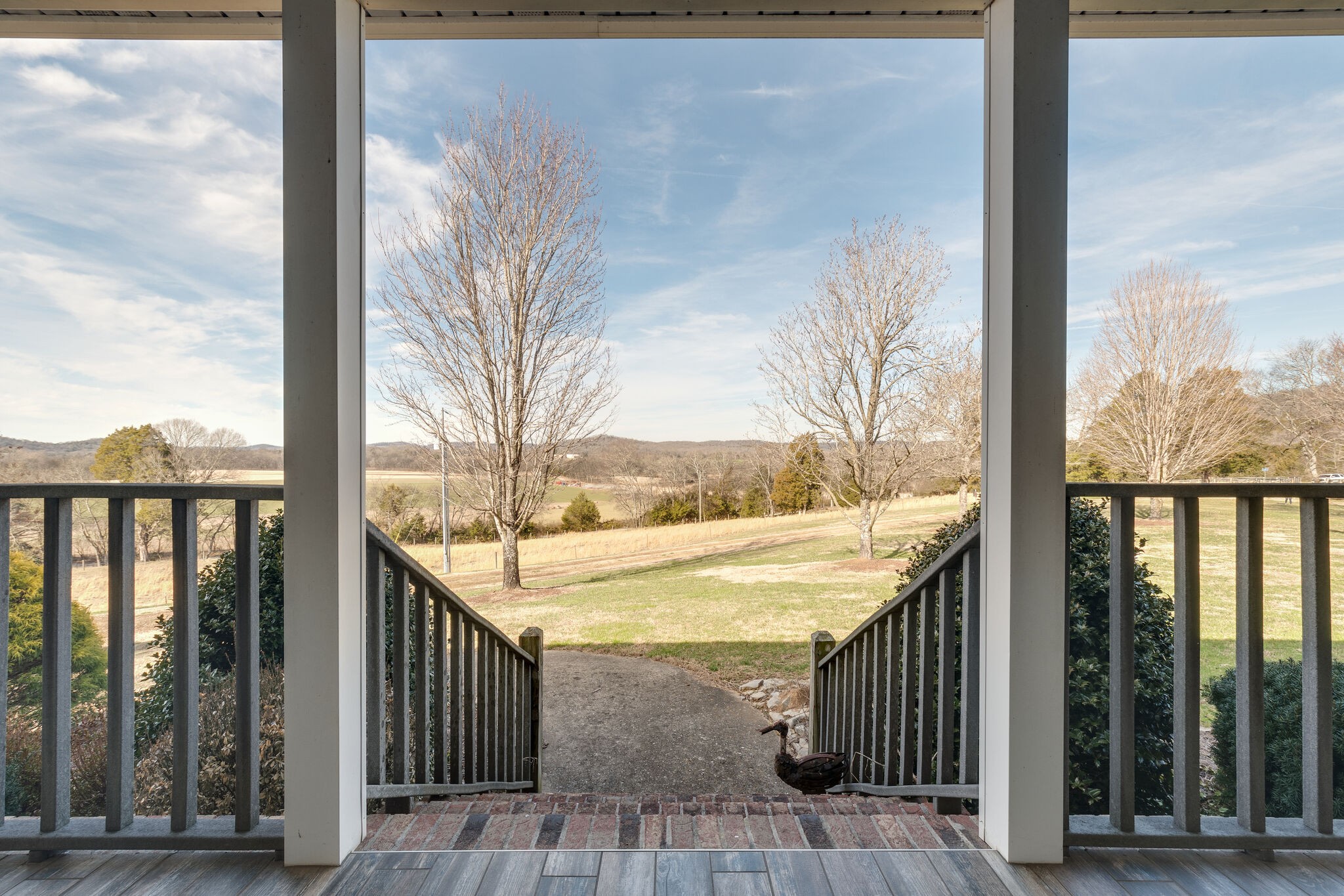 56 Stephens Creek Road Kelso, TN 37348 - Photo 6 of 47 a view of a balcony with a floor to ceiling window wooden floor