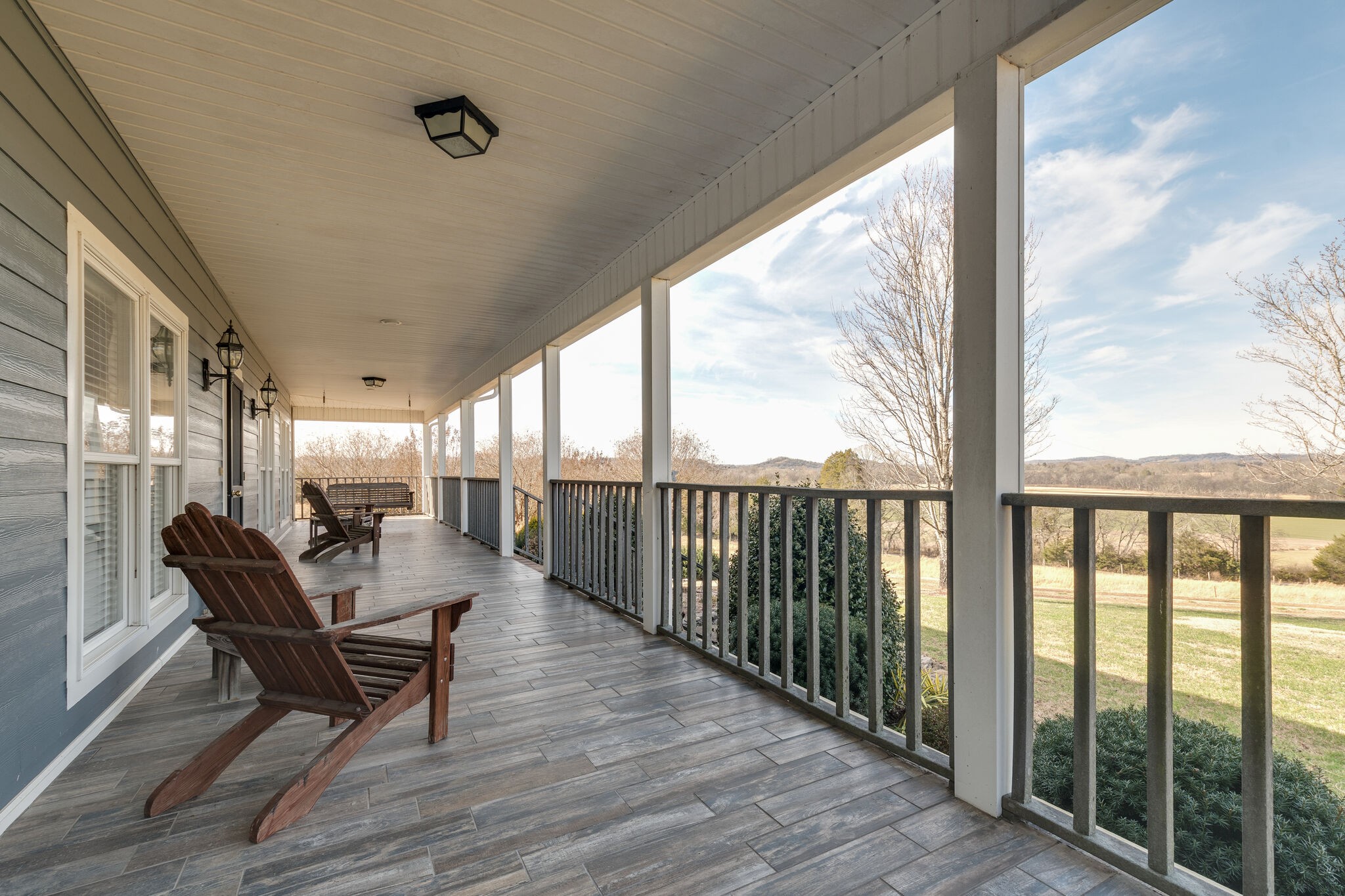 56 Stephens Creek Road Kelso, TN 37348 - Photo 7 of 47 a view of a porch with furniture and wooden floor
