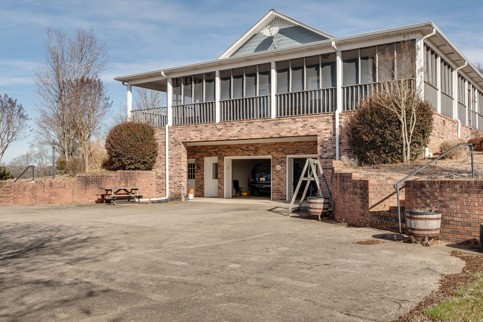 56 Stephens Creek Road Kelso, TN 37348 - Photo 8 of 47 a view of a house with large space and a car park in front of it