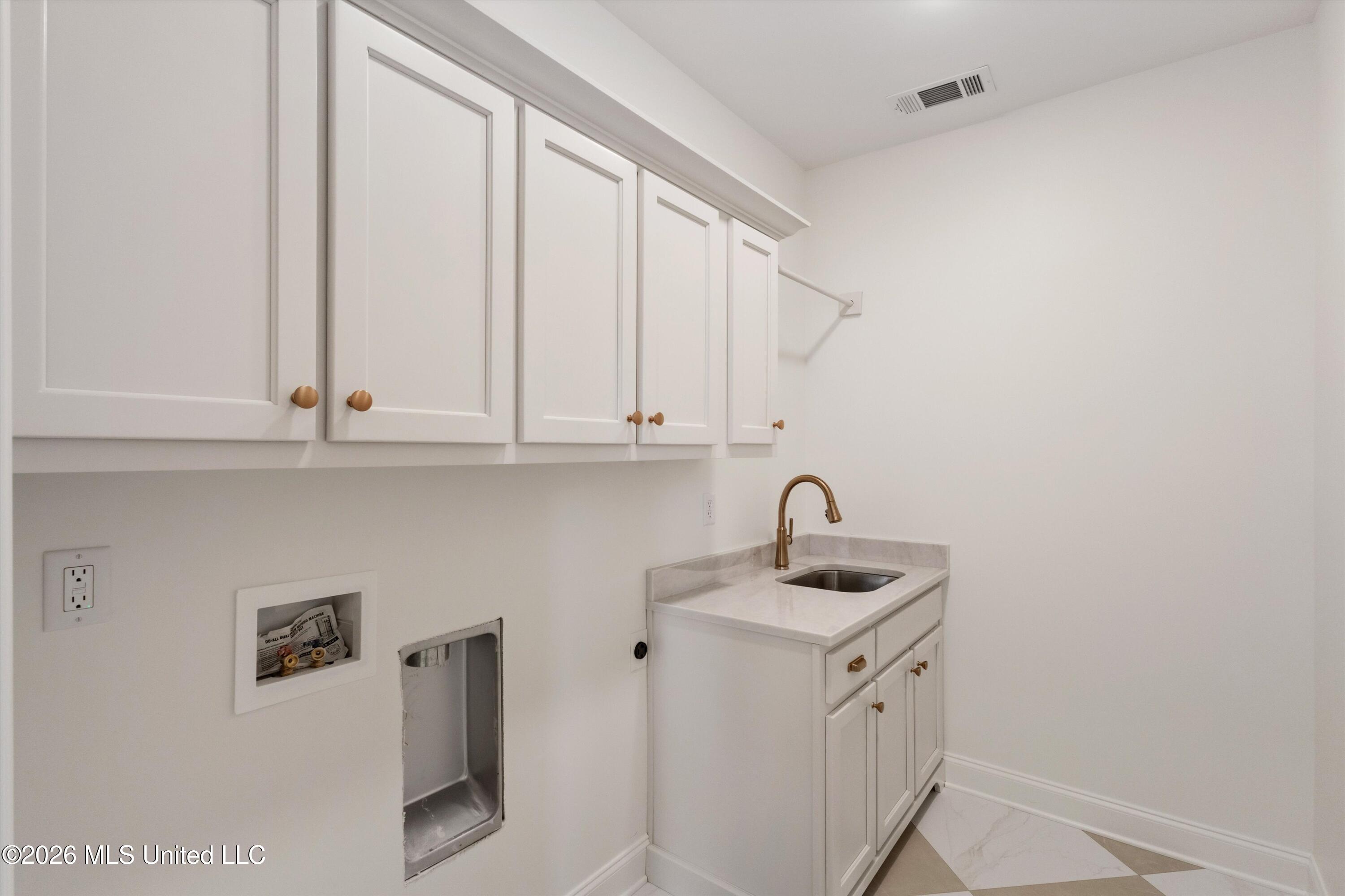 5381 Grayson Way Hernando, MS 38632 - Photo 24 of 43 Laundry Room