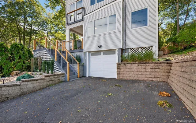 a view of a house with a street