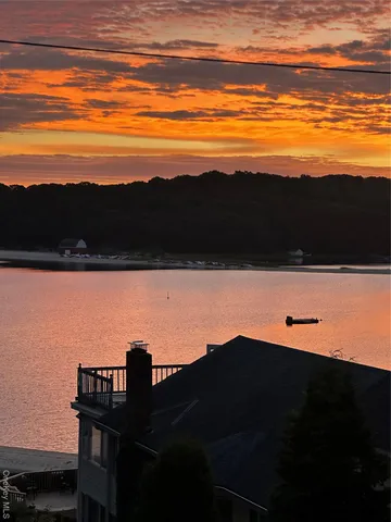a view of a backyard of a house with a mountain