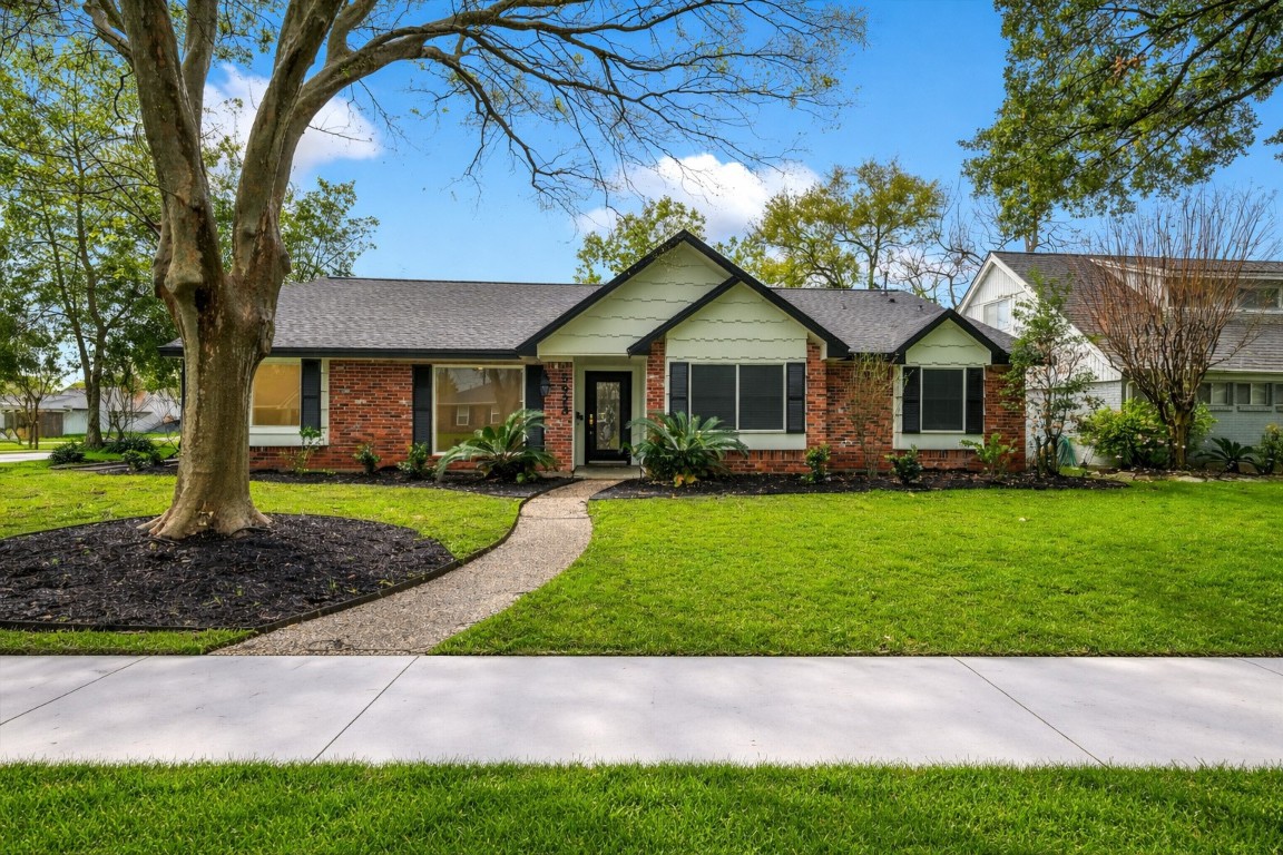 5923 Rutherglenn Drive Houston, TX 77096 - Photo 2 of 46 Lush Landscaping!