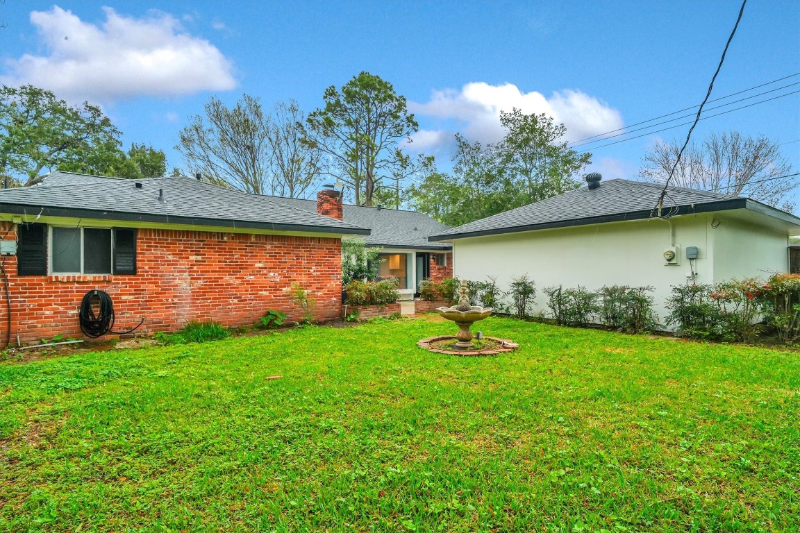 5923 Rutherglenn Drive Houston, TX 77096 - Photo 45 of 46 Lush Landscape in Backyard