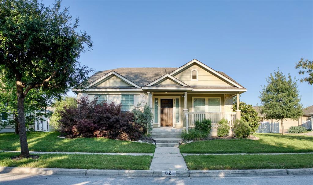 821 Gabriel Mills Drive Round Rock, TX 78664 - Photo 1 of 15 a front view of a house with a garden