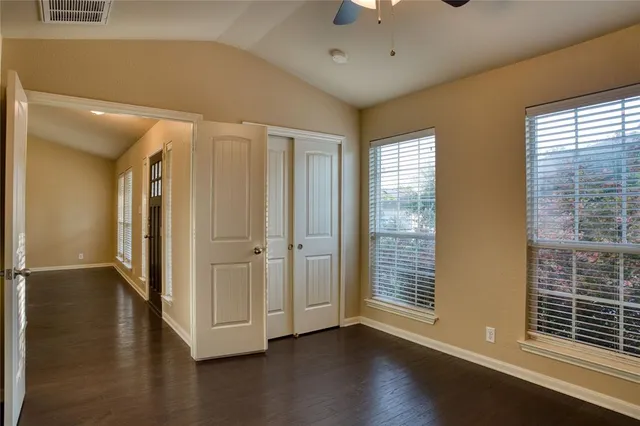 a view of entryway with wooden floor