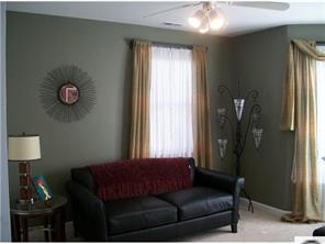 141 Surfside Road Mooresville, NC 28117 - Photo 13 of 16 a living room with furniture and a window