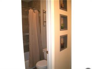 141 Surfside Road Mooresville, NC 28117 - Photo 14 of 16 a bathroom with a sink and a toilet