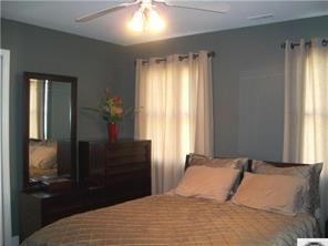 141 Surfside Road Mooresville, NC 28117 - Photo 15 of 16 a bedroom with a bed and a window