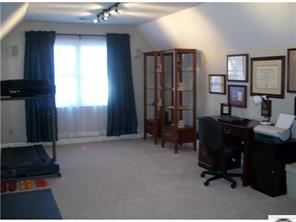 141 Surfside Road Mooresville, NC 28117 - Photo 16 of 16 a room with furniture and a window