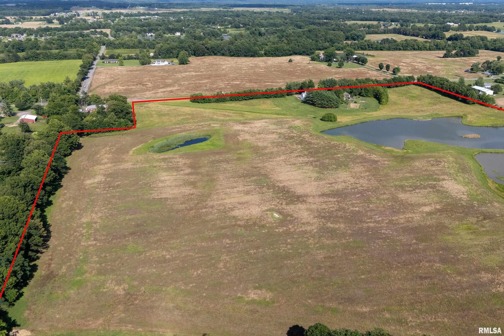 6001 Highway 37 Marion, IL 62959 - Photo 13 of 20 an aerial view of a house with a garden and lake view