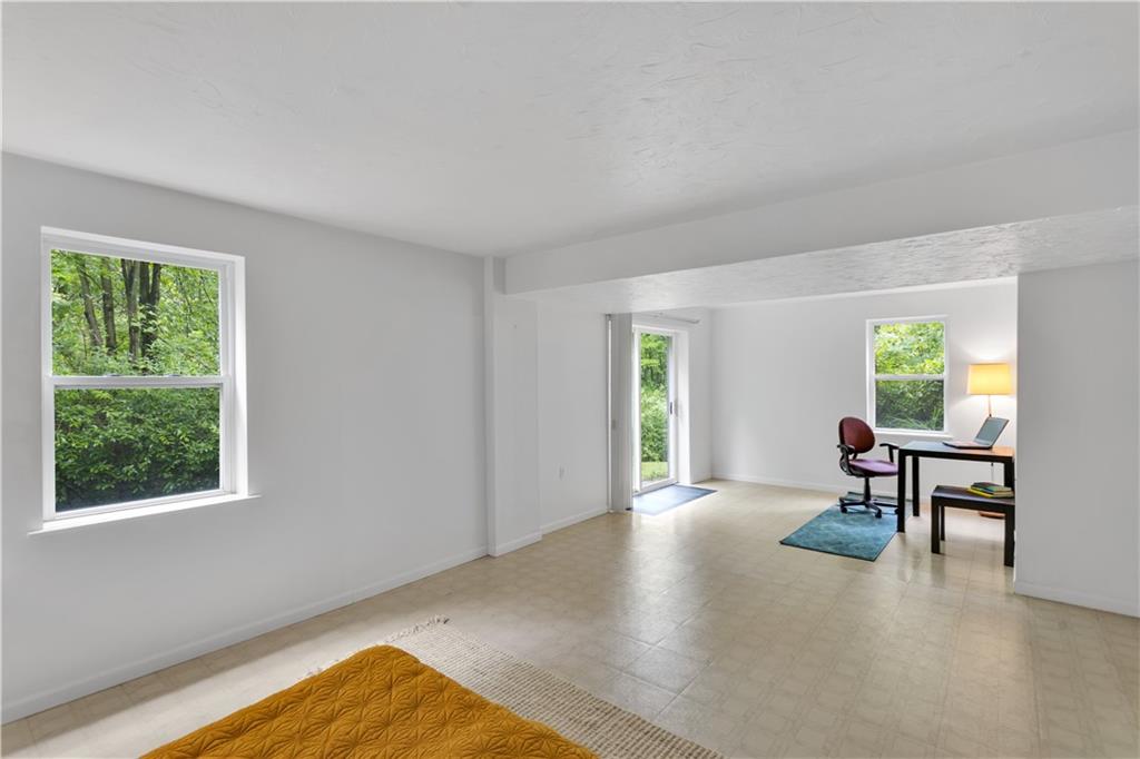 1860 Washington Road Apollo, PA 15613 - Photo 28 of 41 Plenty of Natural Light with 2 large Windows and a Sliding Door to Exit on the Finished Lower Level