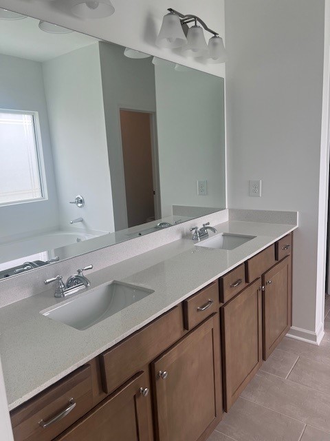348 Winston Way Gallatin, TN 37066 - Photo 25 of 26 a bathroom with a sink and a mirror