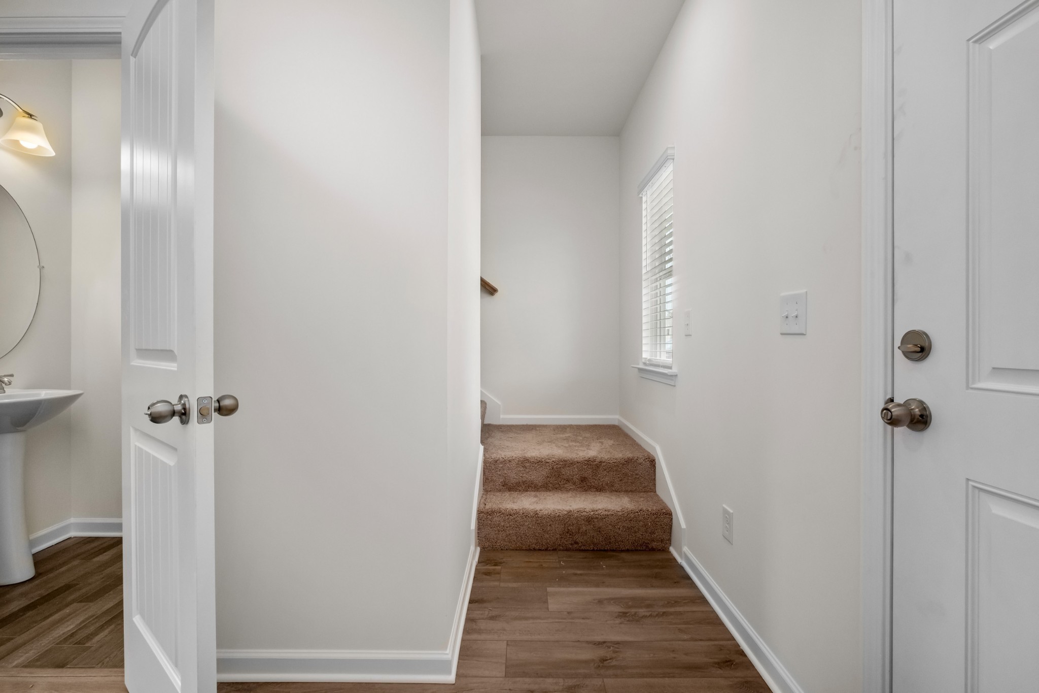 348 Winston Way Gallatin, TN 37066 - Photo 7 of 26 a view of a hallway with wooden floor and closet area