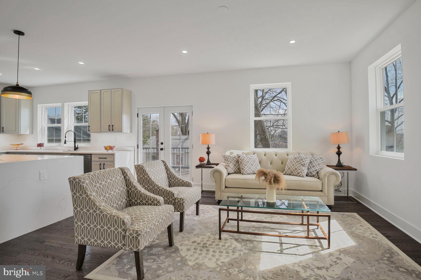 1612 Noyes Drive Silver Spring, MD 20910 - Photo 11 of 37 a living room with furniture and a wooden floor