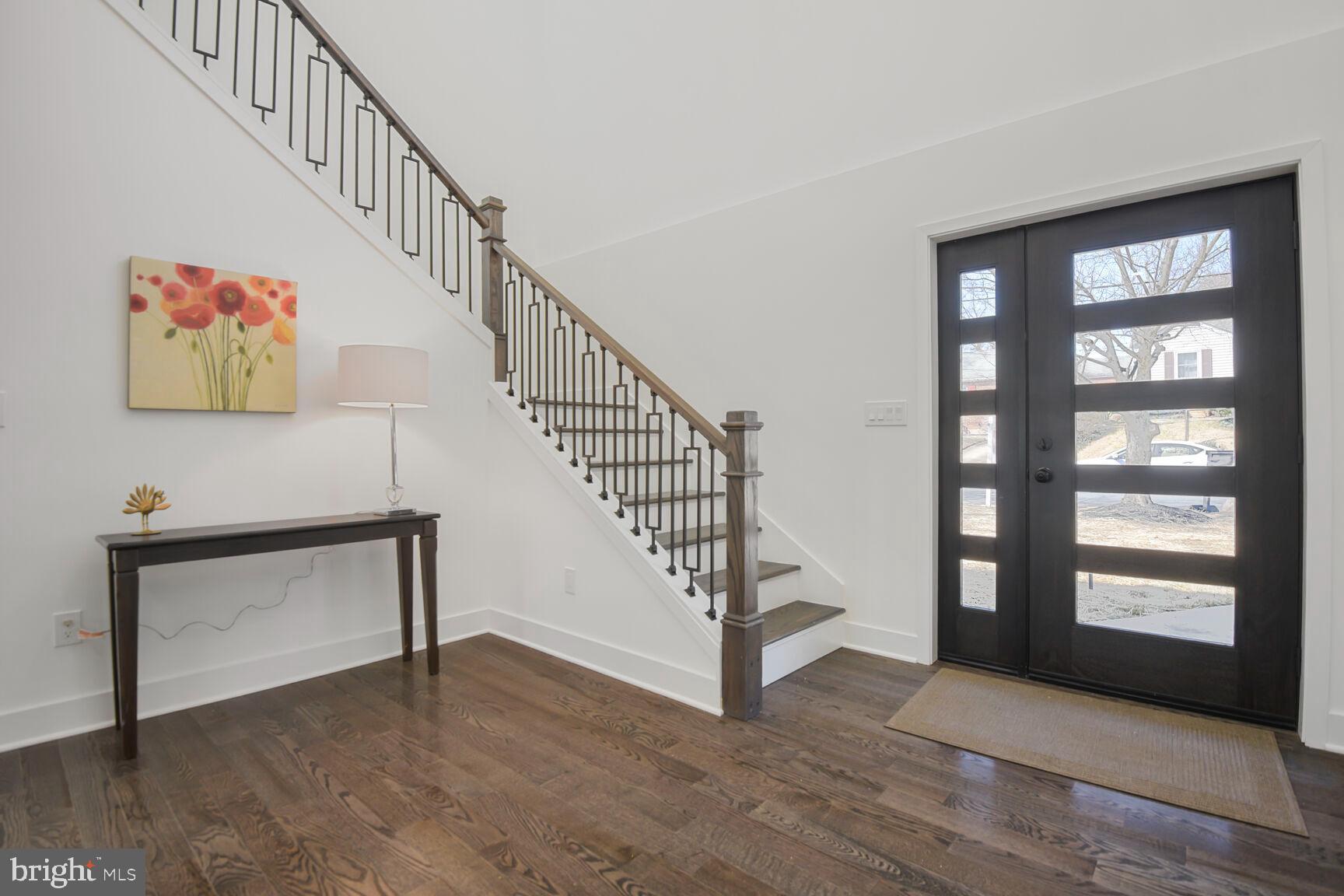 1612 Noyes Drive Silver Spring, MD 20910 - Photo 13 of 37 a view of entryway and hall with wooden floor