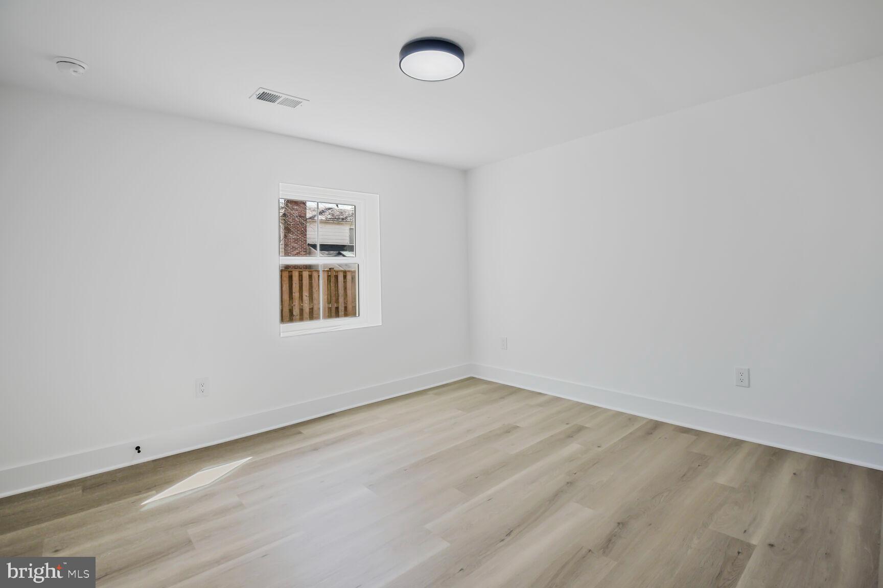 1612 Noyes Drive Silver Spring, MD 20910 - Photo 26 of 37 an empty room with a workbench
