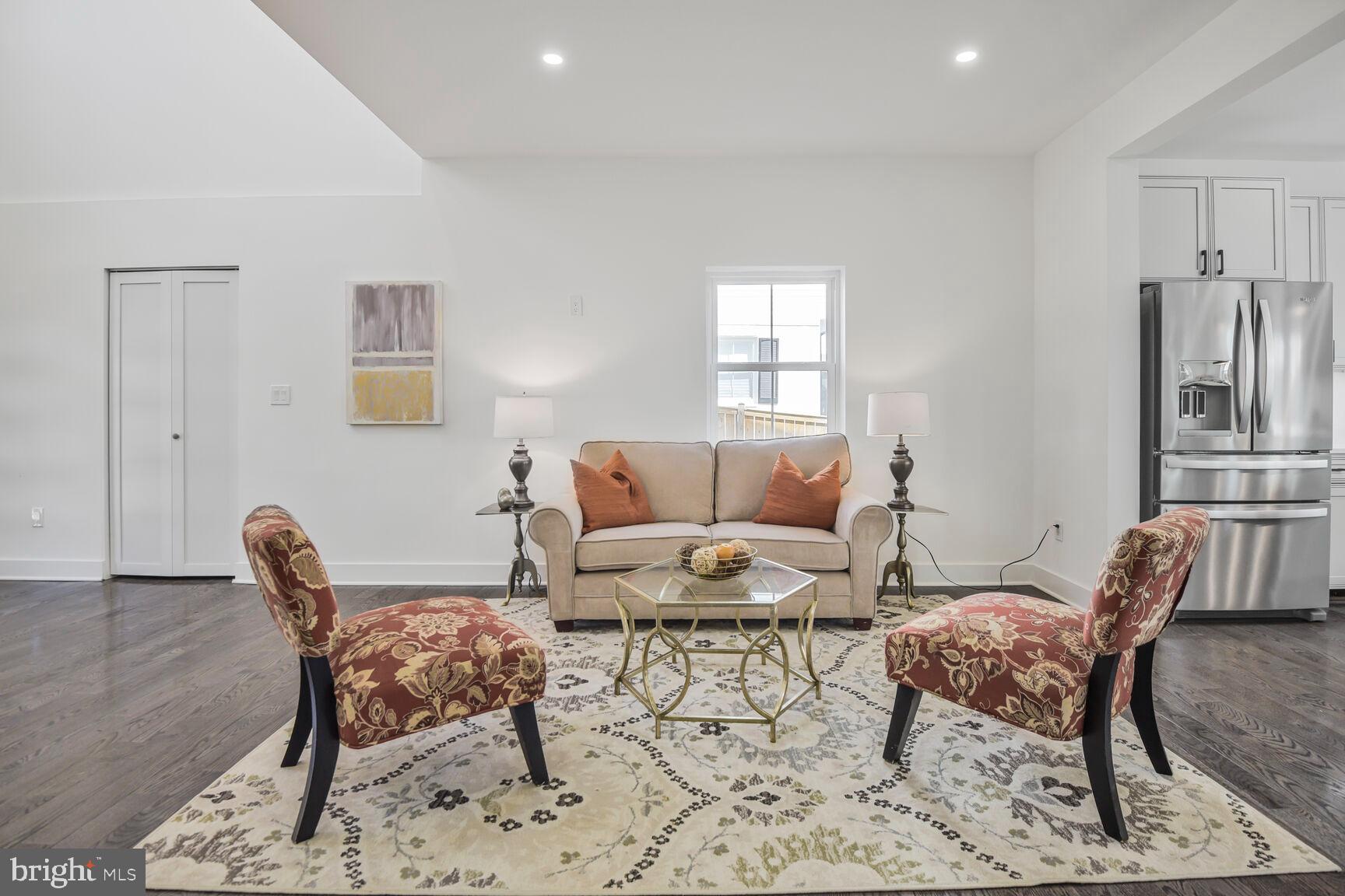 1612 Noyes Drive Silver Spring, MD 20910 - Photo 9 of 37 a living room with furniture and a window