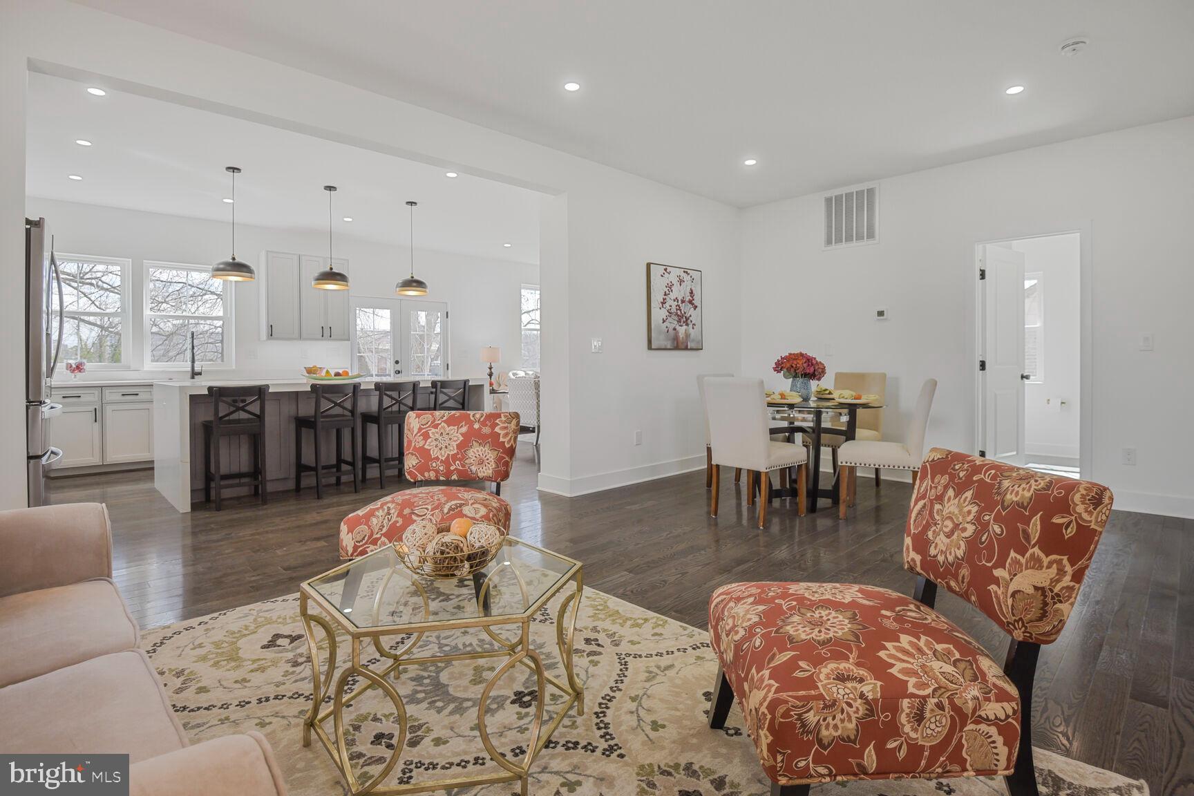 1612 Noyes Drive Silver Spring, MD 20910 - Photo 10 of 37 a living room with furniture and kitchen view