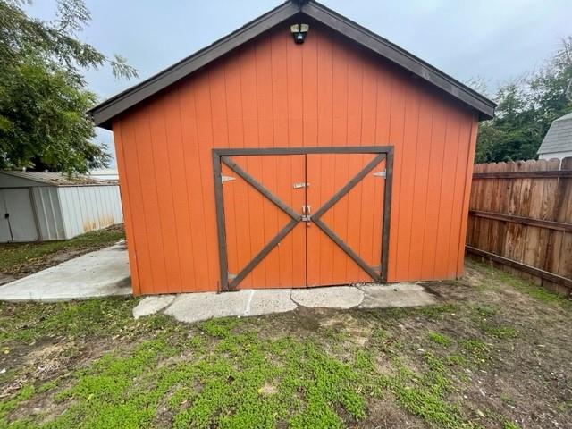 250 Davis Street Turlock, CA 95380 - Photo 11 of 11 a view of a backyard space with wooden fence