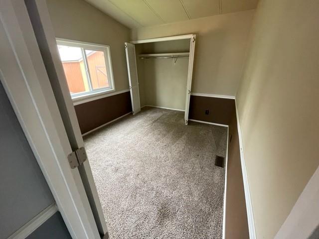 250 Davis Street Turlock, CA 95380 - Photo 7 of 11 view of room with window and refrigerator