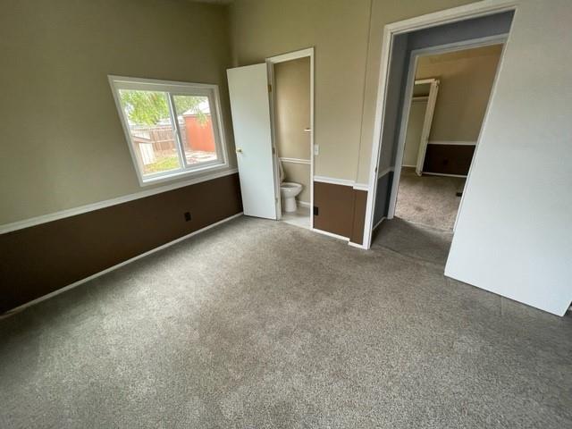 250 Davis Street Turlock, CA 95380 - Photo 8 of 11 an empty room with windows