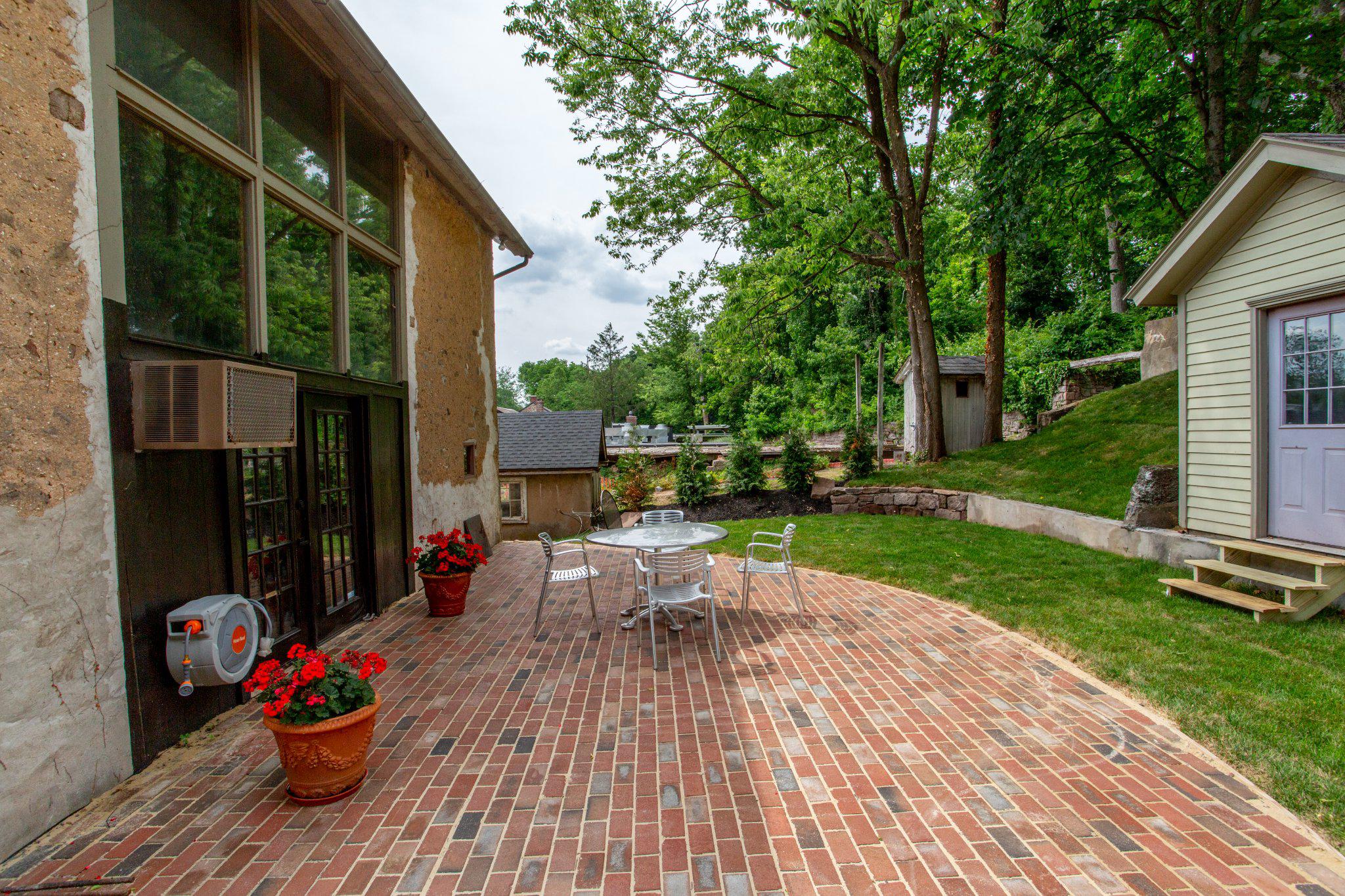 3 South Main Street Stockton, NJ 08559 - Photo 40 of 42 a view of a backyard with sitting area