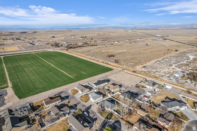 520 East 450th Street North Delta, UT 84624 - Photo 41 of 48 Aerial view of sparsely populated area featuring nearby suburban area and mountains