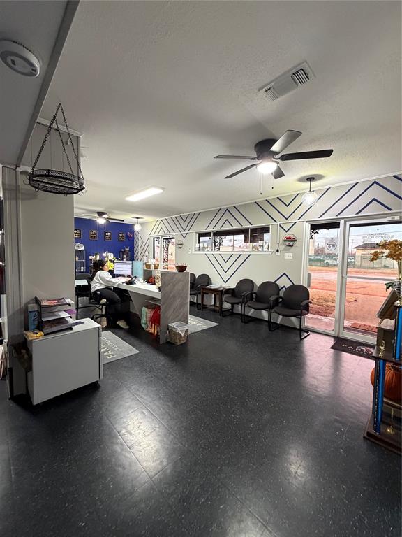 301 West Malloy Bridge Road Seagoville, TX 75159 - Photo 13 of 22 a room with lots of furniture and a chandelier