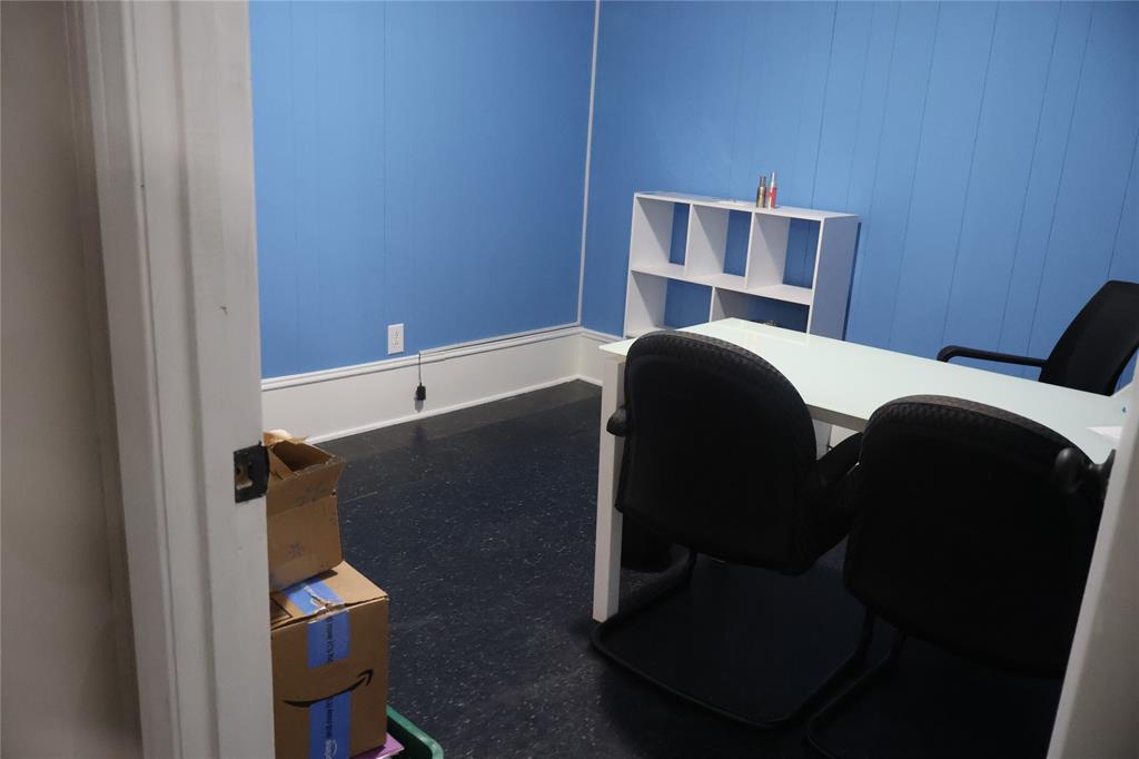 301 West Malloy Bridge Road Seagoville, TX 75159 - Photo 16 of 22 a bedroom with a bed and cabinets