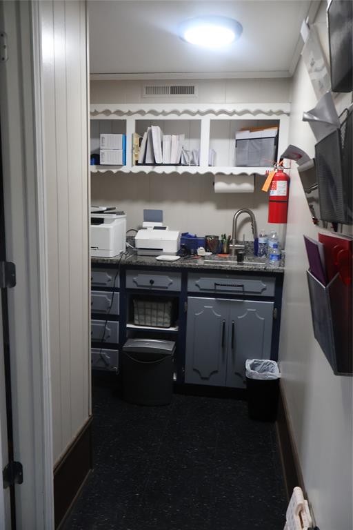 301 West Malloy Bridge Road Seagoville, TX 75159 - Photo 17 of 22 a kitchen with stainless steel appliances a sink and cabinets