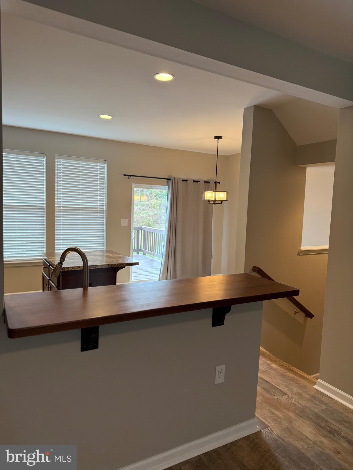 23 Landis Court Falling Waters, WV 25419 - Photo 15 of 45 a kitchen with a sink a counter space and a window