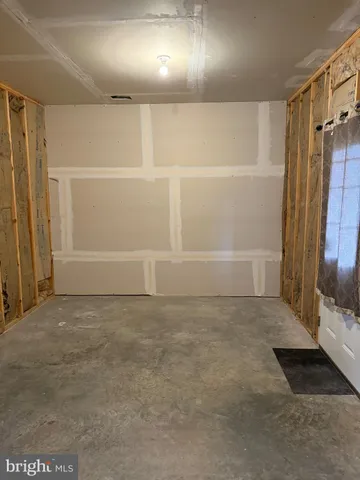 a view of room with racks on the wall