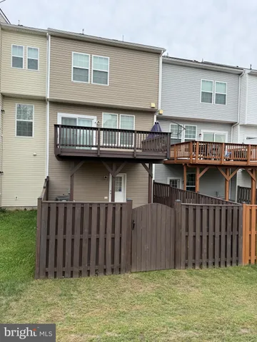a view of backyard with cabin