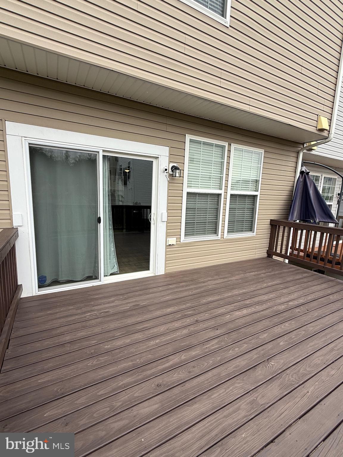 23 Landis Court Falling Waters, WV 25419 - Photo 7 of 45 a view of a house with wooden deck