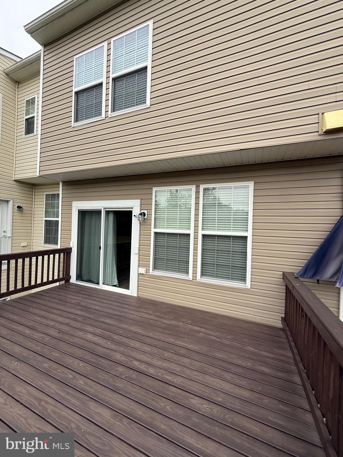 23 Landis Court Falling Waters, WV 25419 - Photo 9 of 45 a view of a house with wooden deck
