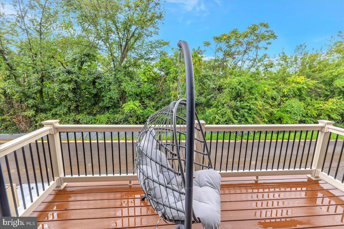 7157 Smoke Stack Road Baltimore, MD 21222 - Photo 10 of 27 a view of deck with a chair