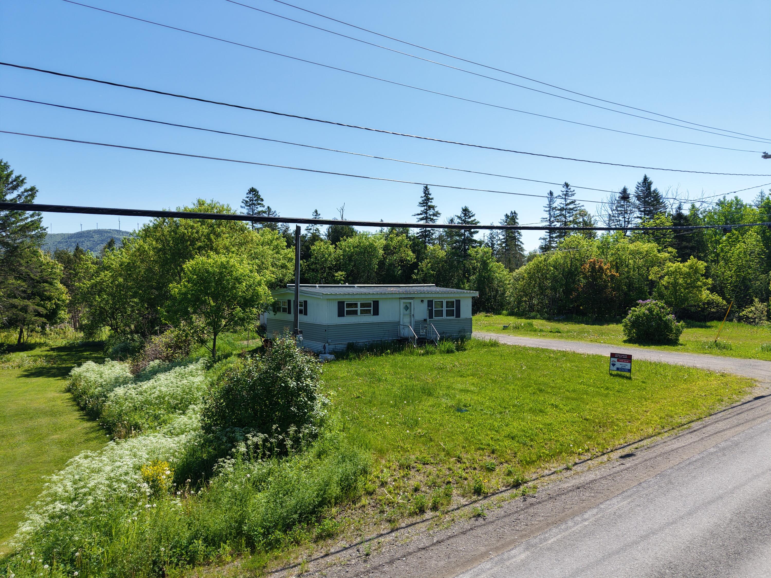 112 Robinson Road Blaine, ME 04734 - Photo 16 of 23 dji_fly_20250907_214052_0424_17811152759