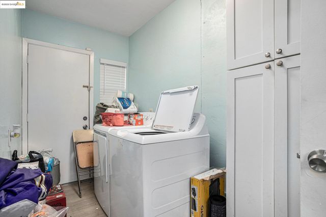 a bathroom with a sink toilet and mirror