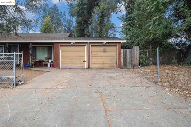 front view of a house with a patio