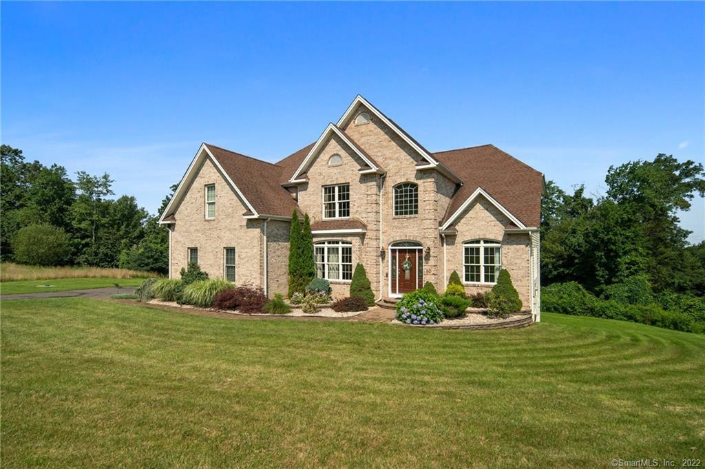 60 Desousa Drive Manchester, CT 06040 - Photo 1 of 1 a front view of a house with garden