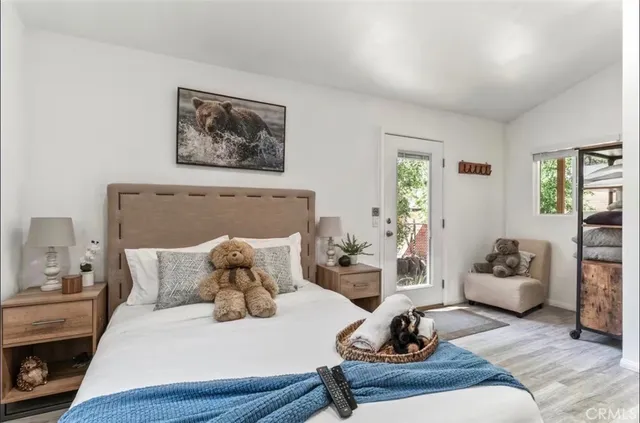 a living room with furniture rug and window