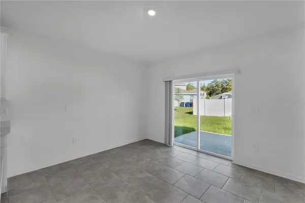 an empty room with outdoor view