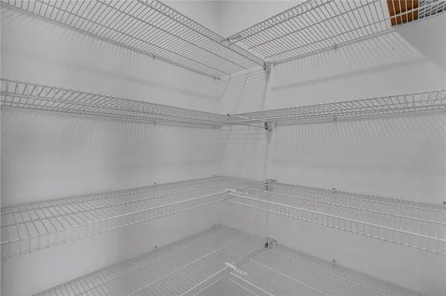 a view of a room with racks on the wall