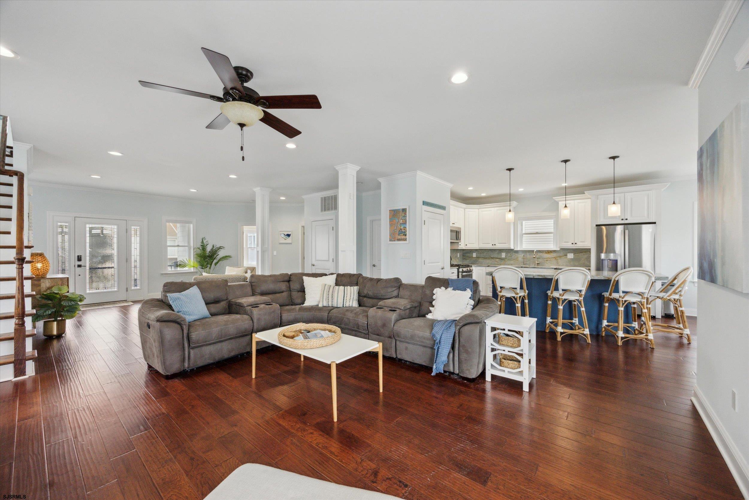 235 35th Street South Brigantine, NJ 08203 - Photo 12 of 56 a living room with lots of furniture and wooden floor