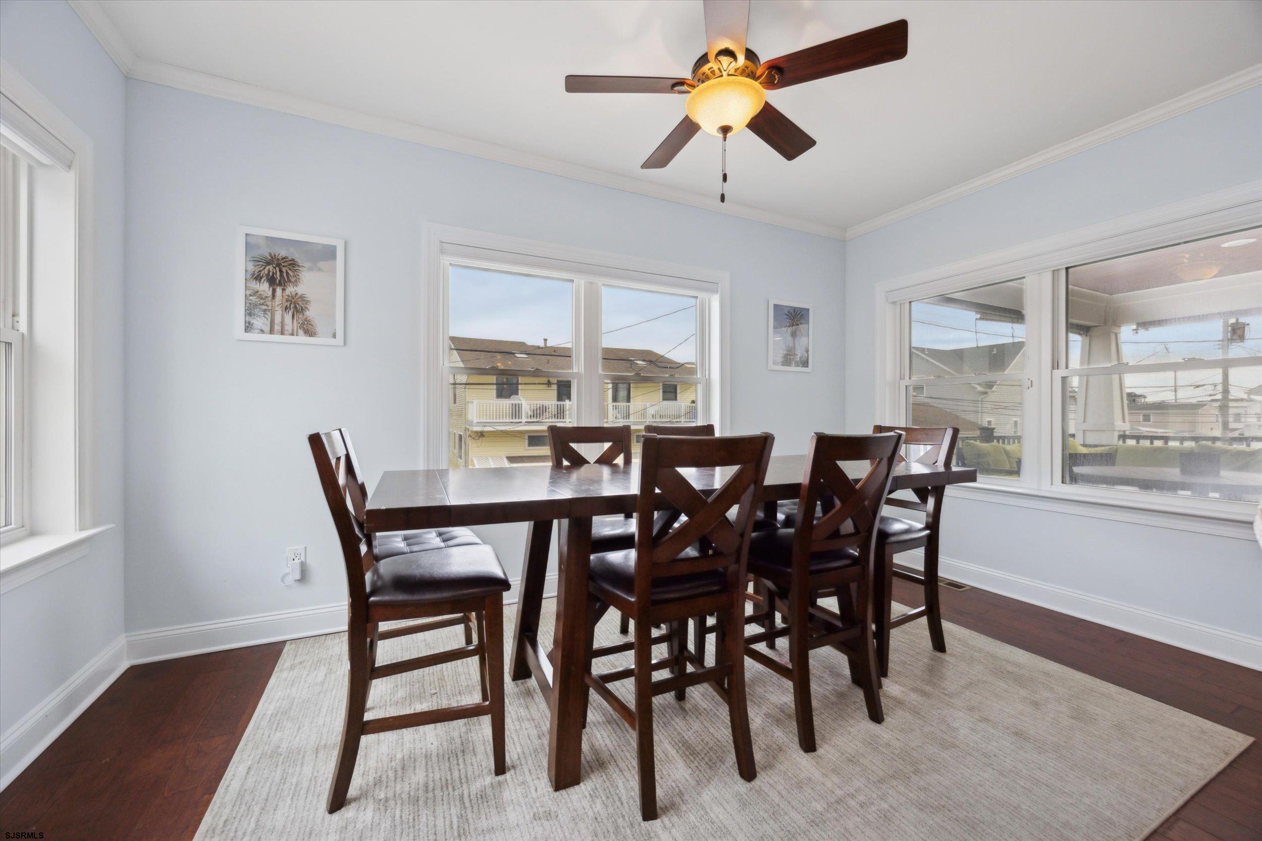 235 35th Street South Brigantine, NJ 08203 - Photo 16 of 56 a view of a dining room with furniture and window