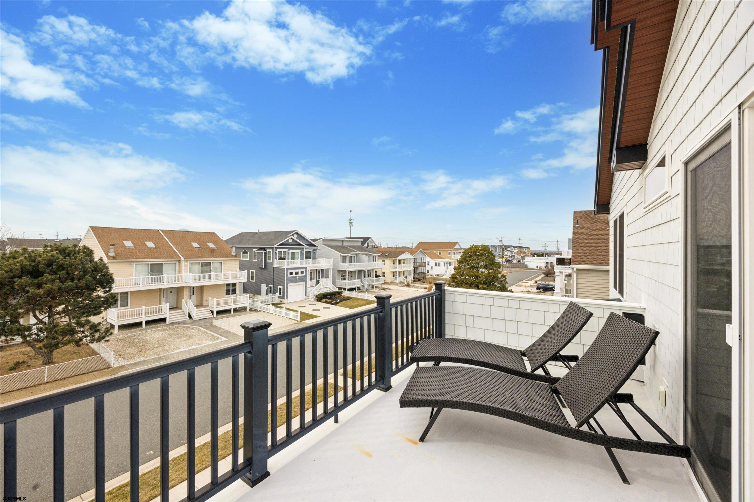 235 35th Street South Brigantine, NJ 08203 - Photo 28 of 56 a view of a terrace with furniture