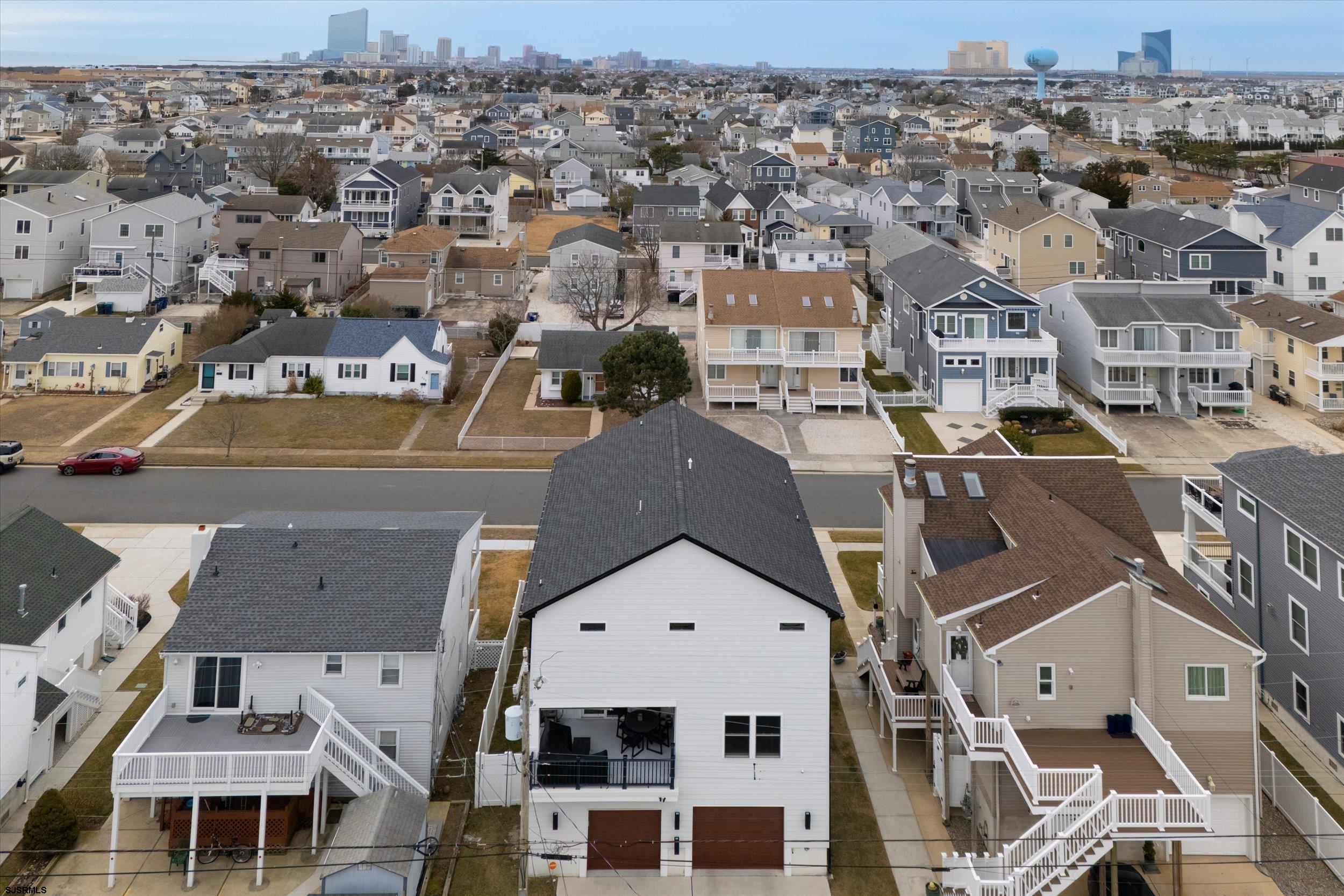 235 35th Street South Brigantine, NJ 08203 - Photo 36 of 56 an aerial view of residential houses with outdoor space