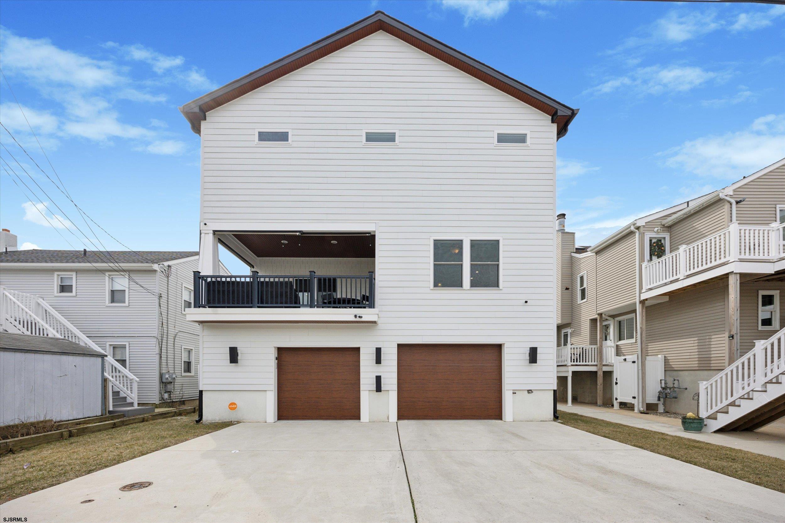 235 35th Street South Brigantine, NJ 08203 - Photo 55 of 56 a view of a white building